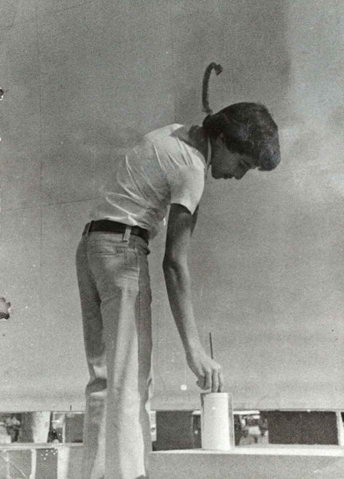 A 1981 photo of Angel Boligán, then around 16, painting a mural in his hometown of San Antonio de los Baños, Cuba. A 1981 photo of Angel Boligán, then around 16, painting a mural in his hometown of San Antonio de los Baños, Cuba.